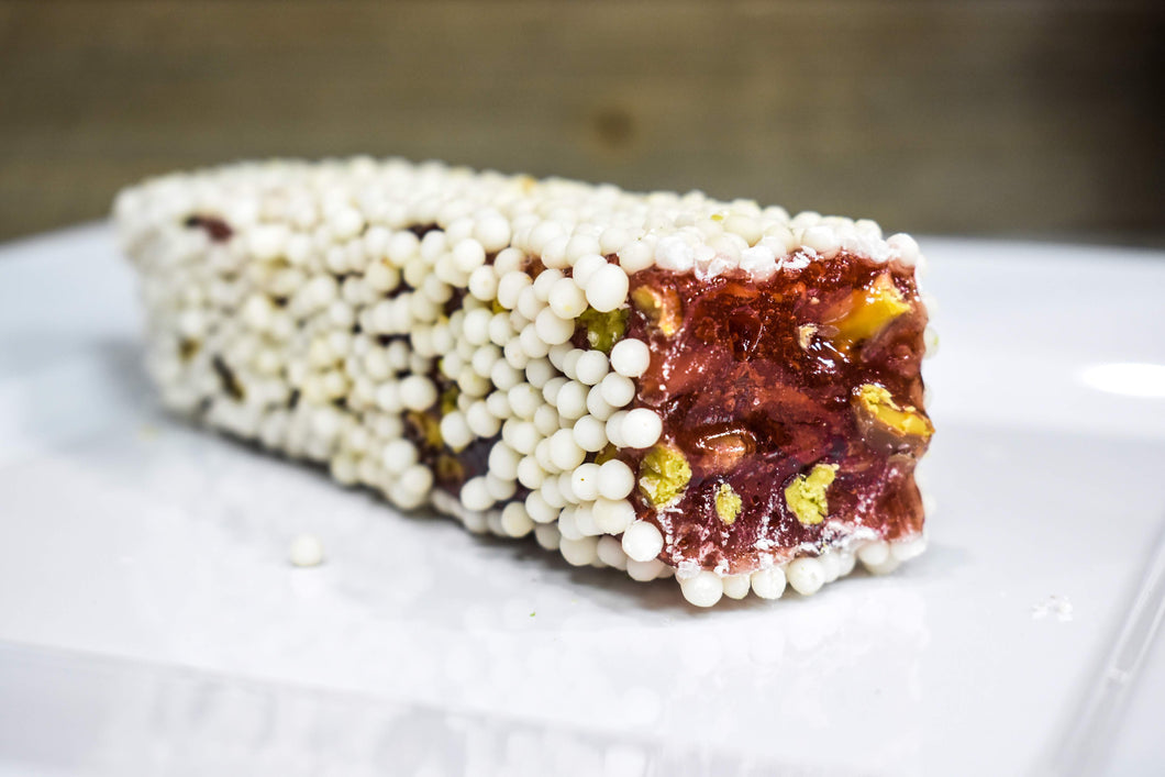 Pomegranate Jelly and Pistachio filled Turkish Delight covered with White Chocolate Pearls